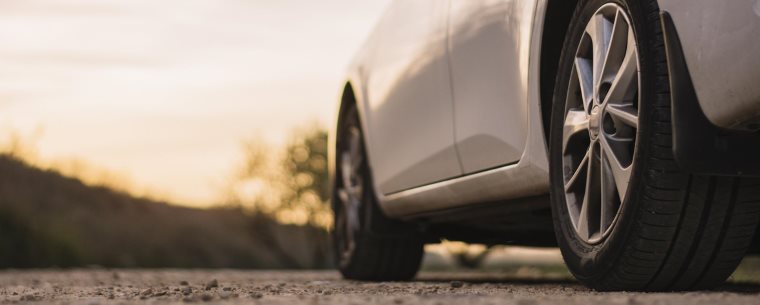 car driving on sunny road