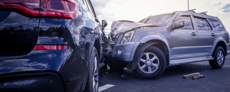 Two cars crashing into each other