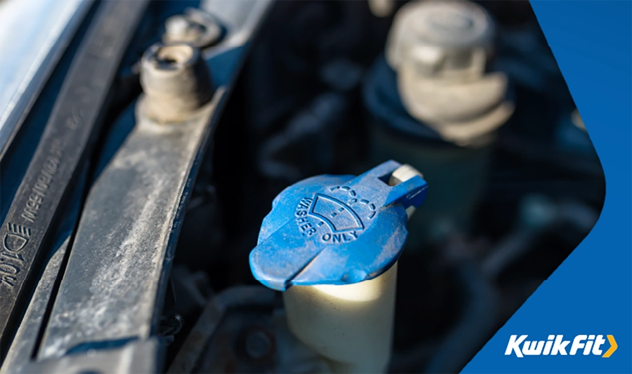 Blue screenwash reservoir cap.