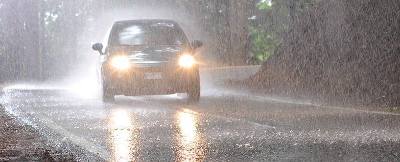 Car on road in the wet 